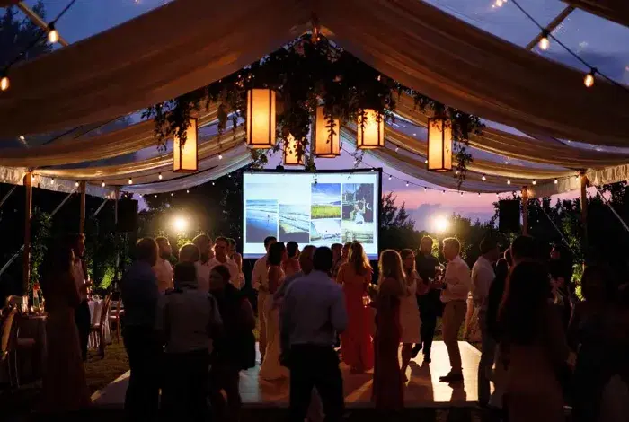 Live slideshow displaying messages at a wedding reception